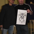Khoi Pham with his Deadpool sketch and the fan that won it.JPG