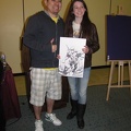 Marcio Takara with Deadpool sketch and the fan that won it