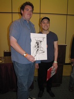 Marcus To with his Deadpool sketch and the fan that won it